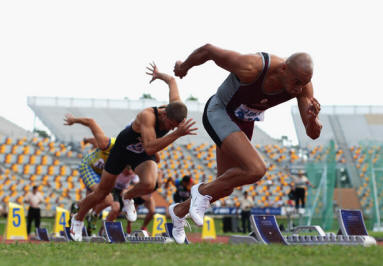 Patrick Johnson Patrick Johnson of the QAS jumps out of the blocks in the Mens 200 Metres Open on day three of the Australian Athletics Championships & Selection Trials at the Queensland Sport and Athletic Centre on March 21, 2009 in Brisbane, Australia.  (Photo by Mark Dadswell/Getty Images) *** Local Caption *** Patrick Johnson